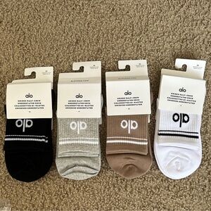 ALO Yoga Half-Crew Socks in Black, Gray, Brown, and White (4-Pack)